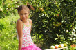 Girl on the apple orchard