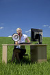 Business Concept Woman Using Megaphone In A Green Field