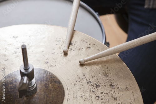 Photo: Drumsticks on metal cymbal Drumsticks on metal cymbal