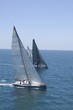Yachts compete in team sailing event, California