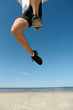 Athlete jumping over camera