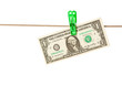 Dollar bills pinned to a clothesline Dollar bills pinned to a clothesline