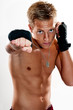Male kickboxer male punshing