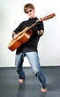 young red-haired guy with a guitar