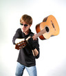 young red-haired guy with a guitar