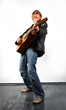 young red-haired guy with a guitar