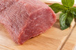 Raw beef on cutting board isolated on white background