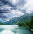 mountains lake under a gloomy sky