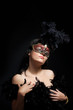 Portrait of elegant woman with venetian mask
