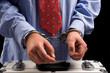 Handcuffs on the man's hands