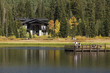 Family enjoys lake in Autumn