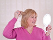 Mature Woman with Mirror