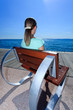 young girl alone at beautiful lakeview (Garda - Italy)