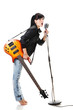 Rock-n-roll girl holding a guitar singing into retro microphone