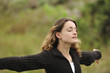woman with her arms wide open