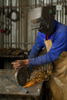 African American with angle grinder