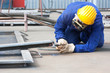 welder with protective mask welding metal and sparks