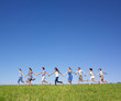 Group Holding hands running