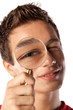 Young man with a magnifying glass Young man with a magnifying glass