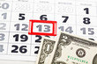 Dollar bills on calendar Dollar bills on calendar