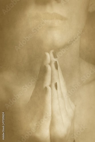 Photo: Background with praying woman Background with praying woman