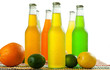 Bunch of wet bottles on white background