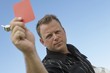 Soccer Referee Showing Red Card