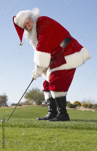 Foto: Santa Claus Playing Golf Santa Claus Playing Golf
