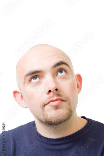 Photo: Young bold man thinking Young bold man thinking