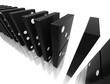 An isolated black domino blocks chain reaction on white backgrou