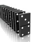 An isolated black domino blocks chain reaction on white backgrou