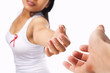 Woman trying to hold hand to give support for AIDS cause or brea