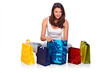 Photo: Beautiful women with colored bags sitting Beautiful women with colored bags sitting
