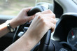 Driver man holds a steering wheel of his car Driver man holds a steering wheel of his car