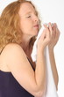 smelling clean laundry - housework - housewife