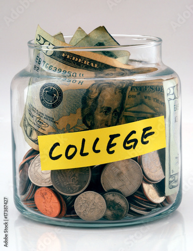 Photo: A lot of money in a glass bottle labeled “College” A lot of money in a glass bottle labeled “College”