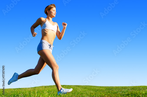 Photo: Fit Young Woman Working Out Fit Young Woman Working Out