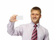 Business man handing a blank business card over white background