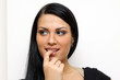 Closeup portrait of a funny woman standing indoors