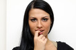 Closeup portrait of a funny woman standing indoors