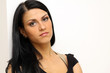 Closeup portrait of a funny woman standing indoors
