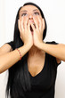 Closeup portrait of a funny woman standing indoors