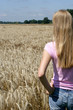 Graceful girl standing on field