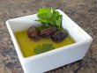 Olives in dish textured background Olives in dish textured background