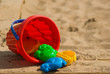 Red childrens bucket and moulds