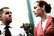 Business people conversation downtown outside tinted