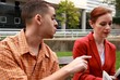 Man and Woman Talking City Park