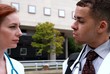 Two doctors downtown outside talking