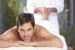 Healthy man relaxing at spa