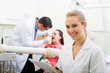 Foto: dtnental assistant in dentist office dtnental assistant in dentist office